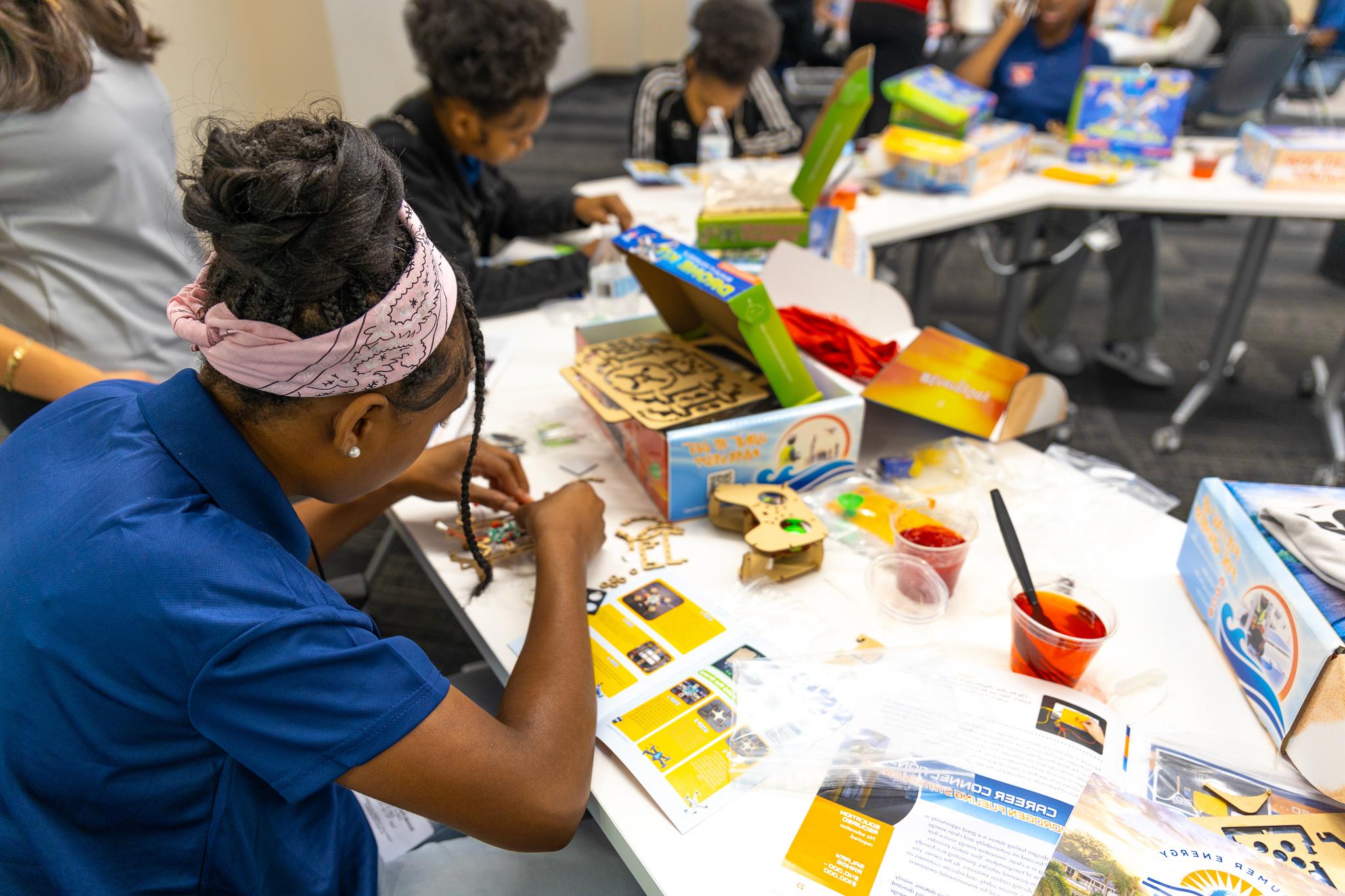 Students working at the STEM Workshop